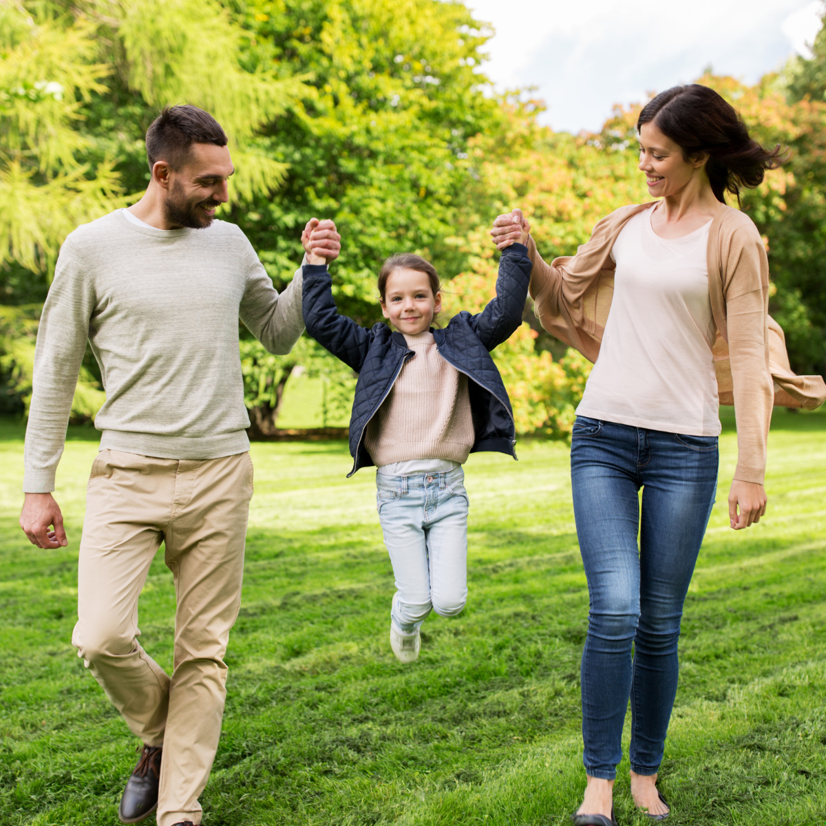 Family Enjoying an Active Day Outside in a Park